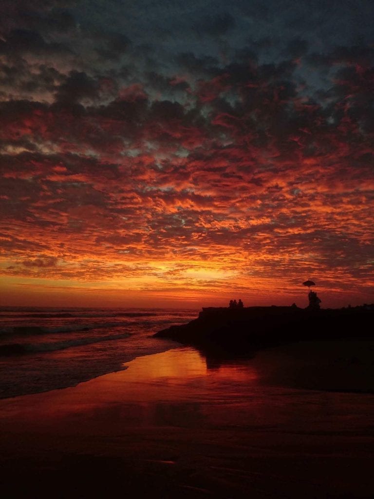 A beautiful sunset at the beach in Canggu, Bali.